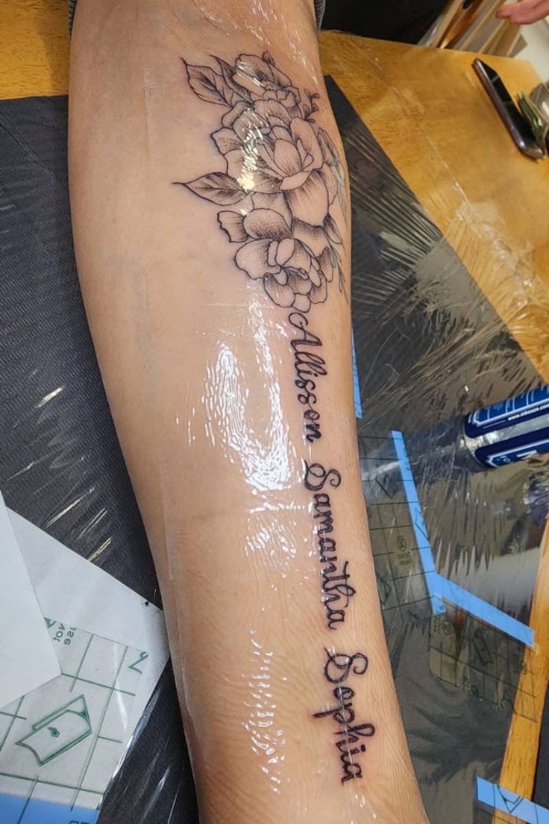 lower arm tattoo